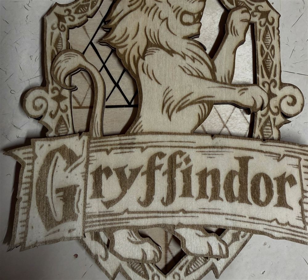 Laser cut and engraved Gryffindor house crest with a rampant lion